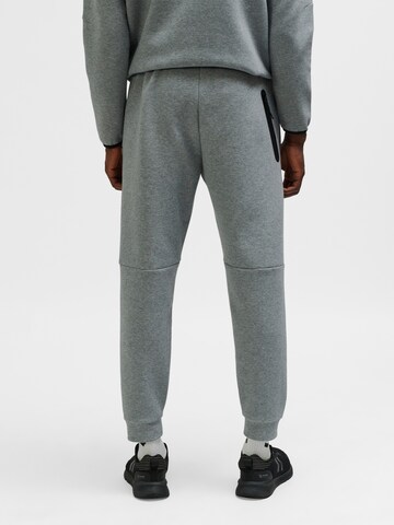 Hummel Tapered Sports trousers in Grey