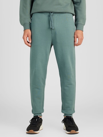 HUGO Red Tapered Pants 'Dayote' in Green: front