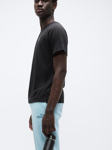 PUMA Regular Sportbroek 'ESS No. 1' in Blauw