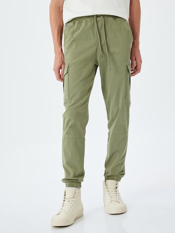 Koton Regular Broek in Groen: voorkant