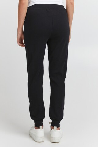 Oxmo - Tapered Pantalón 'Liz' en negro