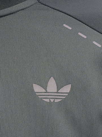 ADIDAS ORIGINALS Jogging ruhák 'TECH ESS' - szürke