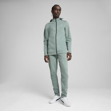 PUMA Sports sweat jacket 'EVOSTRIPE' in Green