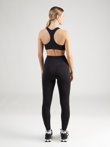 NIKE Skinny Sporthose 'Universa' in Schwarz