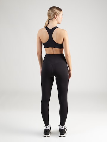 NIKE Skinny Sportsbukser 'Universa' i sort