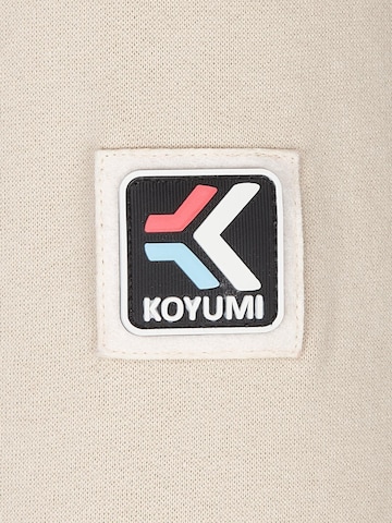 Koyumi Sweatshirt 'Free your Neck' in Beige