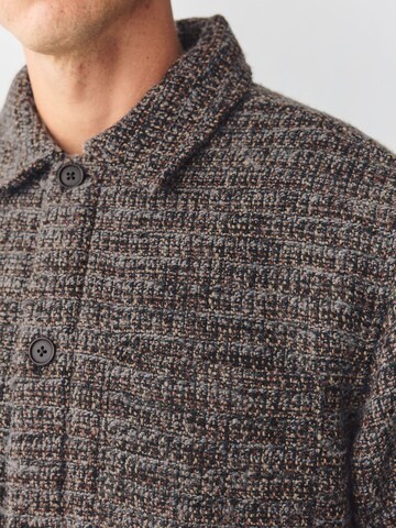 Next Tussenjas in Bruin