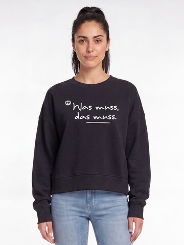 Sweat-shirt 'Was Muss Das Muss' Watapparel en noir : devant