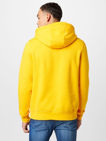 TOMMY HILFIGERRegular Fit Sweater majica - žuta boja