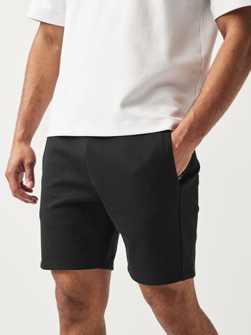 Next Slimfit Broek in Zwart: voorkant