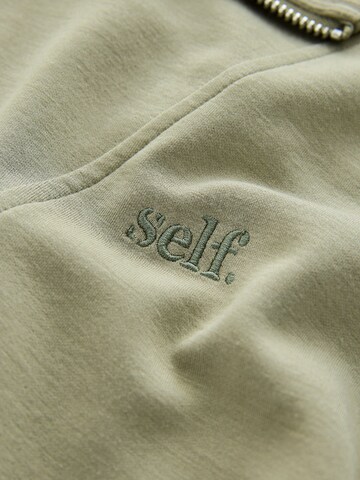 Felpa di self. in verde