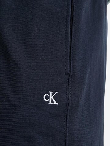 Calvin Klein Jeans Regular Sportbroek 'PREMIUM TERRY MONOGR LV04RC279G' in Blauw