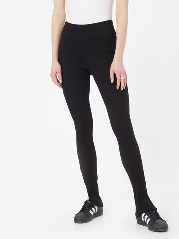 ALPHA INDUSTRIES Slim fit Leggings in Black: front