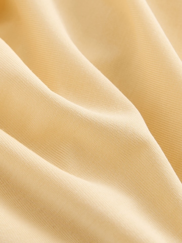 Haut Next en jaune