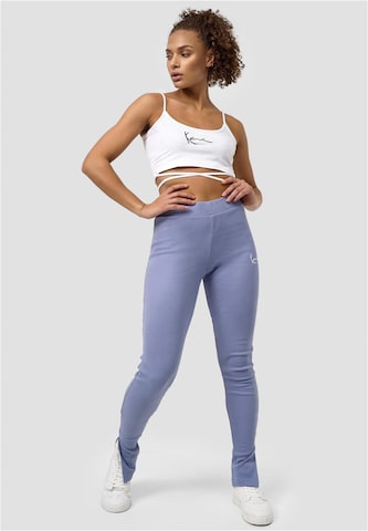 Skinny Leggings di Karl Kani in lilla