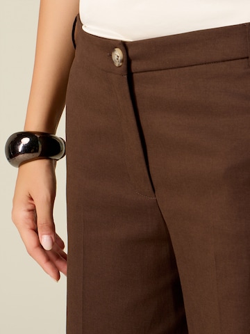 Baggy Pantaloni di oltre in marrone
