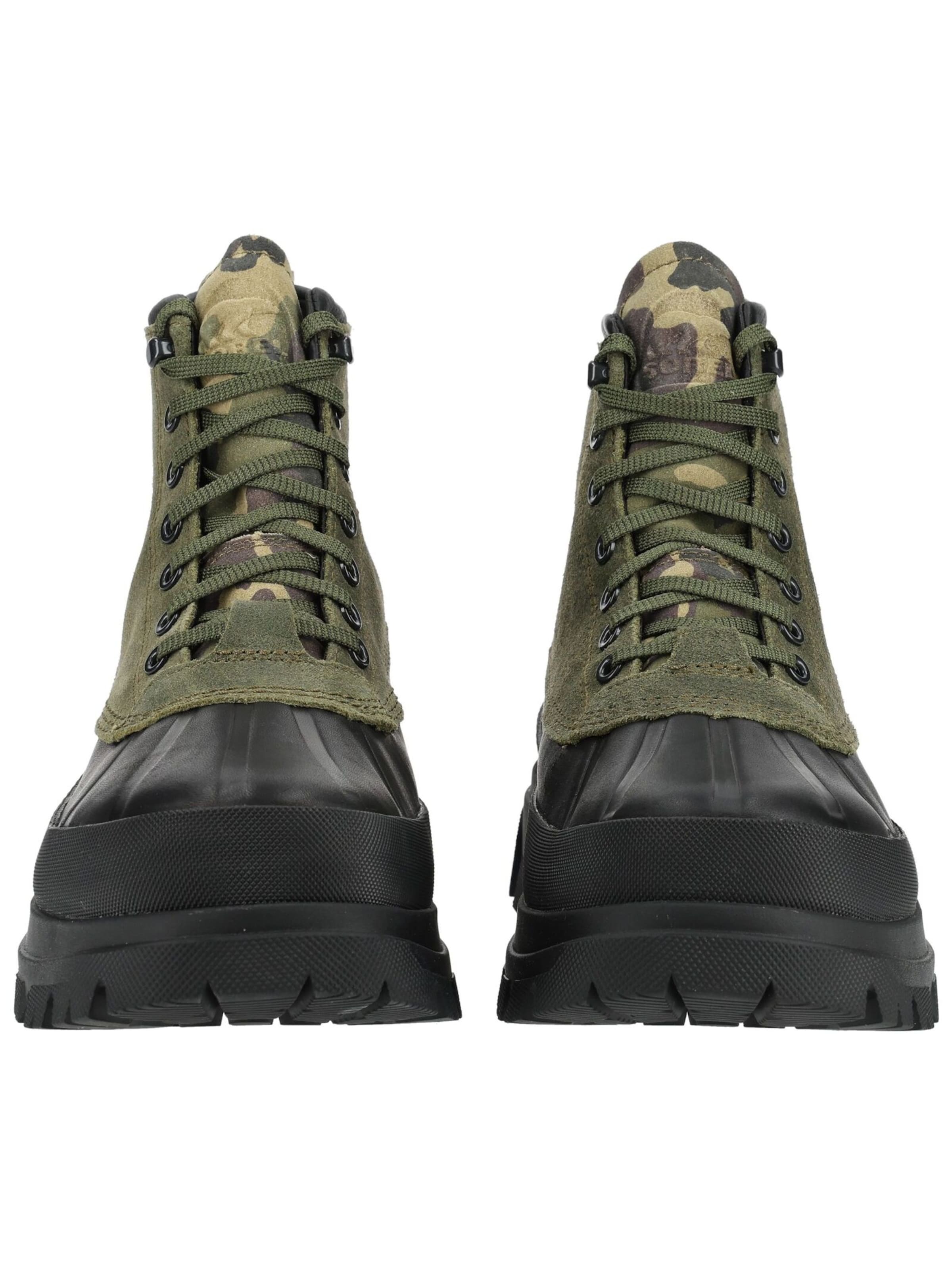 Boots stringati di SOREL in verde