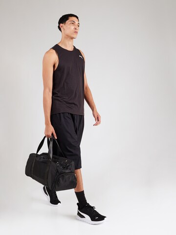 Maglia funzionale 'Tad Tech Triblend' di PUMA in nero