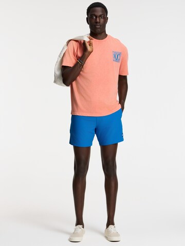 Tricou 'Finn Paradise Block' de la Shiwi pe portocaliu