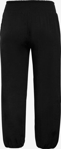 SHEEGO - Tapered Calças em preto