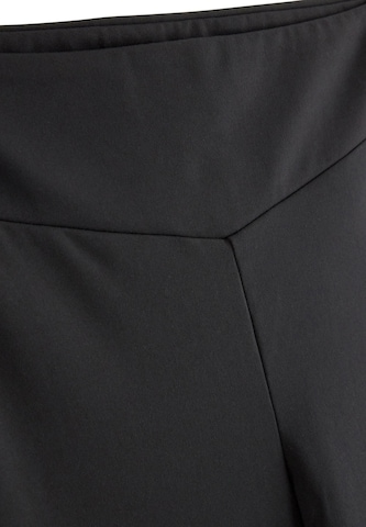 Evazați Pantaloni de la Lindex pe negru