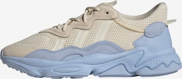 Baskets basses 'Ozweego' ADIDAS ORIGINALS en beige : devant