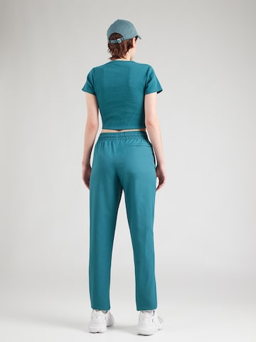 UNDER ARMOUR Ozke Športne hlače 'Unstoppable' | zelena barva