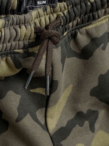 Next Tapered Hose in Grün