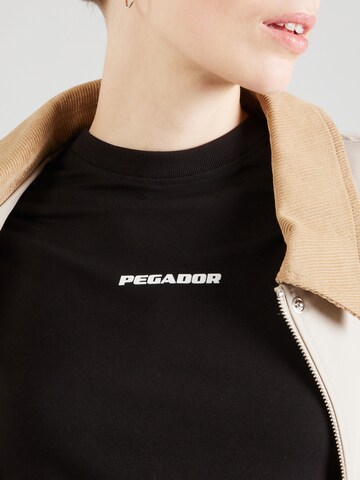 Pegador Tričko 'YONA' – černá