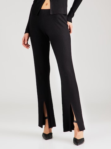 ABOUT YOU x Chiara Biasi Flared Pants 'Delia' in Black: front