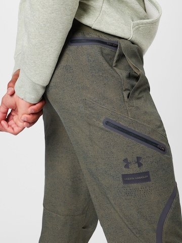 UNDER ARMOUR Regularen Športne hlače 'UNSTOPPABLE' | zelena barva