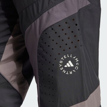 Effilé Pantalon de sport ADIDAS BY STELLA MCCARTNEY en noir