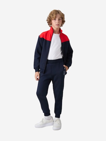 Tommy Life Trainingspak 'TOMMY Kinder Sport-Set' in Gemengde kleuren: voorkant