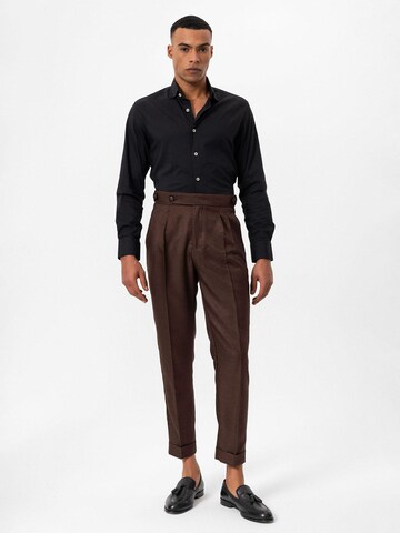 Antioch Tapered Pleat-front trousers in Brown