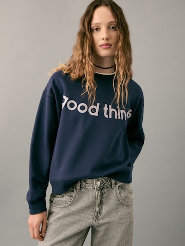 MANGO TEEN - Sudadera 'Things' en azul: frente