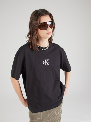 Regular T-shirt Calvin Klein Jeans en noir : devant