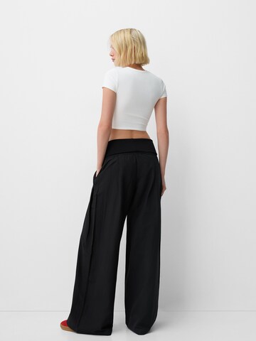 Bershka Wide leg Pleat-front trousers in Black