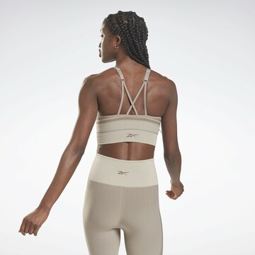 Reebok - Bustier Sujetador deportivo en beige