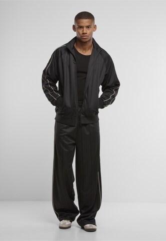 Regular Pantalon Karl Kani en noir