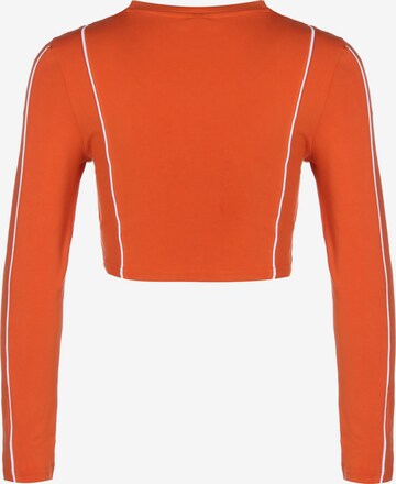 ELLESSE - Camisa 'Russia' em laranja