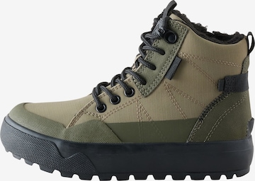 Next - Botas en verde: frente
