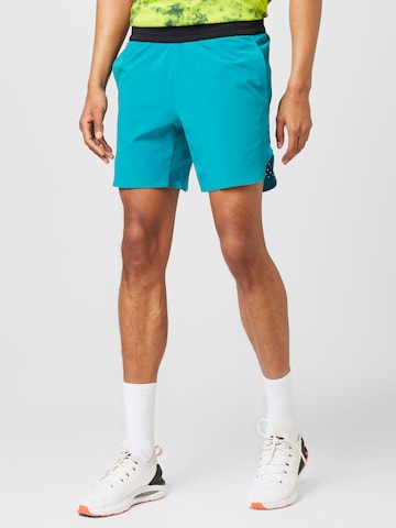 UNDER ARMOUR Štandardný strih Športové nohavice 'Peak' - Modrá: predná strana