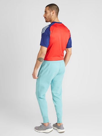 ADIDAS PERFORMANCE - Tapered Pantalón deportivo 'Spain Travel' en verde