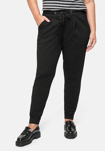 SHEEGO Slim fit Pleat-Front Pants in Black: front