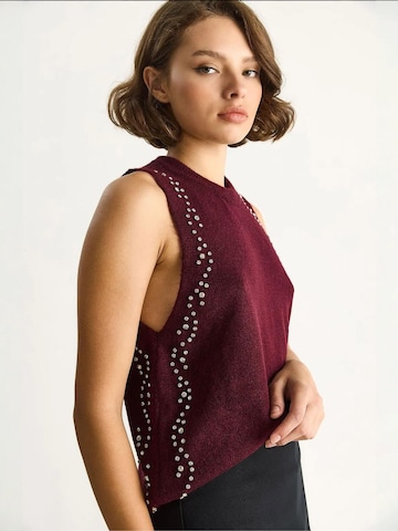 Top in maglia di Bianco Lucci in rosso