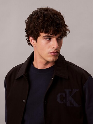 Calvin Klein Jeans Преходно яке в черно