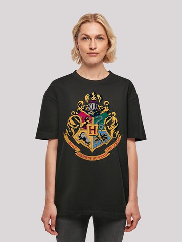 F4NT4STIC Shirt 'Harry Potter Hogwarts Crest Gold' in Zwart: voorkant