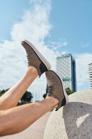 Rieker Slip-Ons in Beige