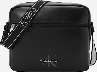 Rankinė su ilgu dirželiu iš Calvin Klein, spalva – tamsiai pilka / juoda / balta, Prekių apžvalga