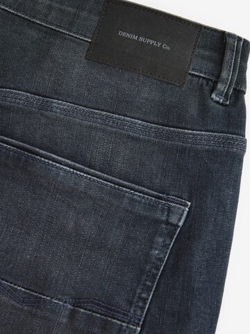 Next Slimfit Jeans i grå